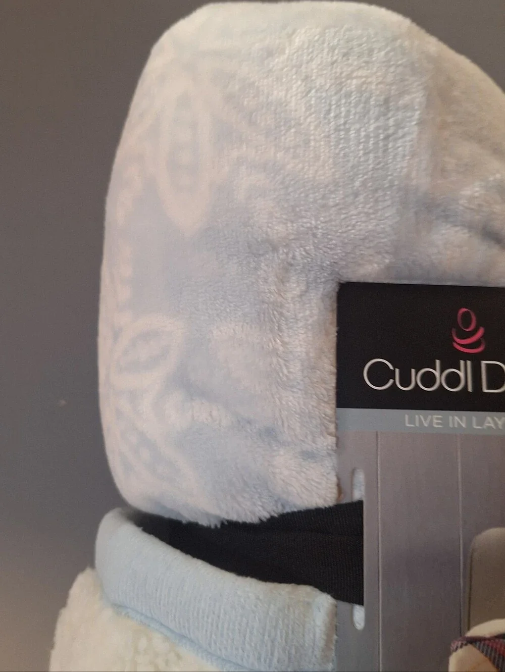 Cuddl Duds Blue Snowflake Throw is a cozy and stylish